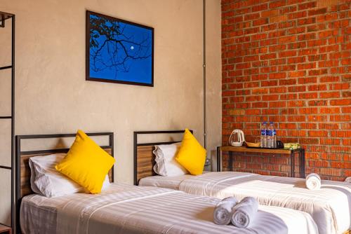 Postel nebo postele na pokoji v ubytování Sebayu Retreat Gopeng