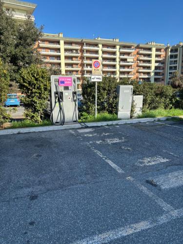 a gas pump sitting on the side of a street at The Garden Suite Airport in Ponte Galeria