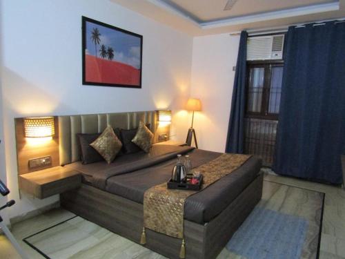 a living room with a couch and a table at Peaceful Stay in New Delhi