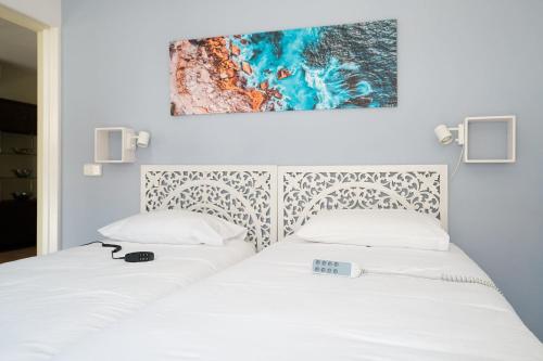 Postel nebo postele na pokoji v ubytování Siena Urban Live Canarias
