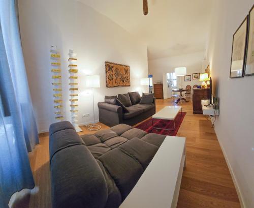a living room with a couch and a table at Casa Margherita in Ancona