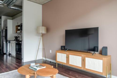 A television and/or entertainment centre at Blueground S Lake Union nr tech bars dining SEA-712