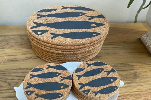 two baskets sitting on top of a wooden table at Doleen House in Ballyconneely