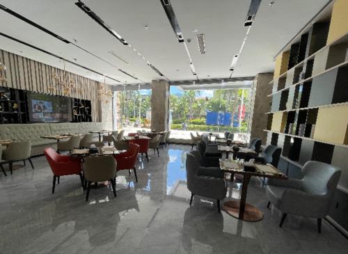 ห้องอาหารหรือที่รับประทานอาหารของ Echarm Hotel Changjiang Shilu