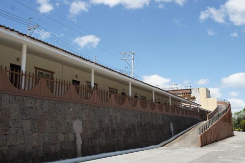 a wall with a skateboard ramp on top of it at Forest Crest Nature Hotel and Resort Powered by ASTON in Nasugbu