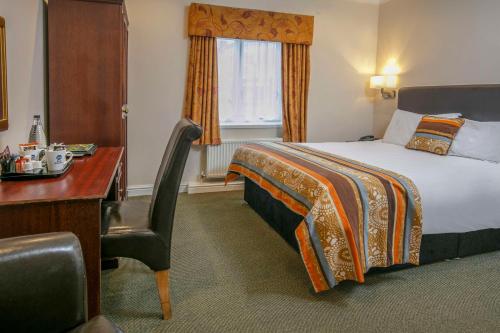 Un ou plusieurs lits dans un hébergement de l'établissement Best Western Forest and Vale Hotel