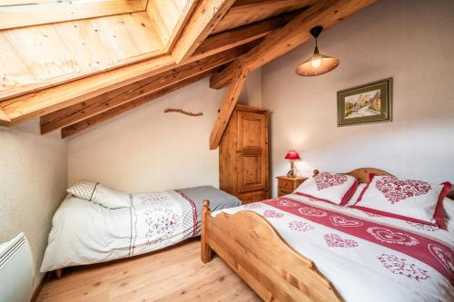 Cama o camas de una habitación en L' Etoile des Neiges