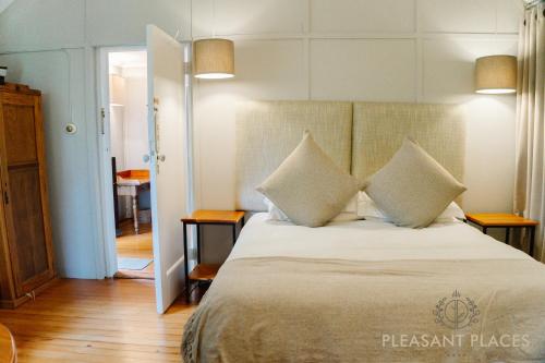 Un ou plusieurs lits dans un hébergement de l'établissement Pleasant Places By Sanaandi