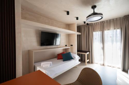 Katil atau katil-katil dalam bilik di Apartamentos Playazul