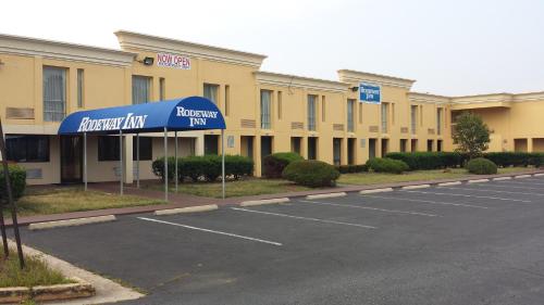 an empty parking lot in front of a hotel at Rodeway Inn Joint Base Andrews Area in Camp Springs