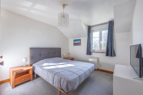 Postel nebo postele na pokoji v ubytování Gîte Les Petites Landes - Piscine privée proche plages