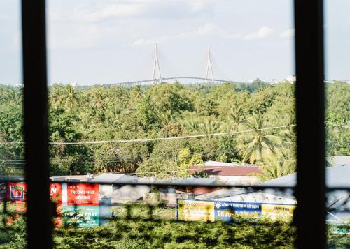 a view from a window of a train at NAM CẦN THƠ HOTEL in Ấp Phú Thạnh (4)