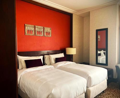 Кровать или кровати в номере Saja Makkah Hotel