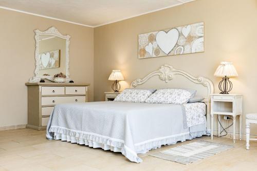 Postelja oz. postelje v sobi nastanitve Villa delle Ulie By Vivimy