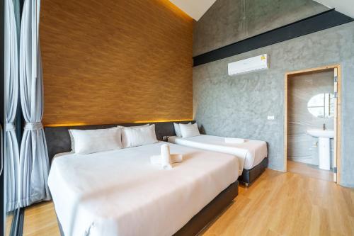 Postel nebo postele na pokoji v ubytování Dojo poolvilla beach resort - private beach villa-