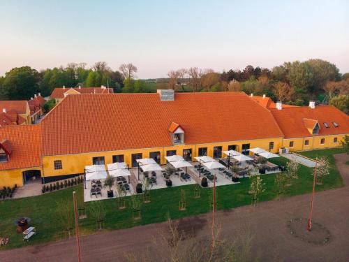 an overhead view of a building with an orange roof at Broløkke Herregård in Humble