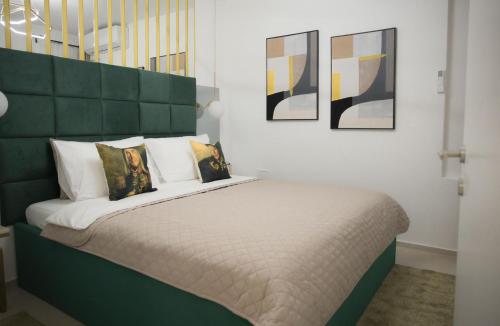 Voodi või voodid majutusasutuse Modern Getaway in City Centre toas