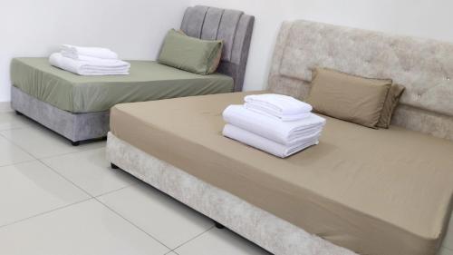Ein Bett oder Betten in einem Zimmer der Unterkunft Happy Chamang Guest House