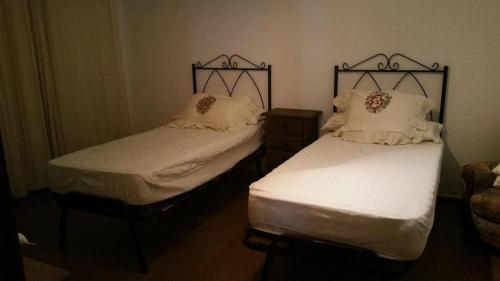 Posteľ alebo postele v izbe v ubytovaní Casa Mis Nietos
