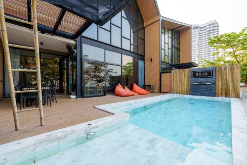 Bazén v ubytování Dojo poolvilla beach resort - private beach villa- nebo v jeho okolí