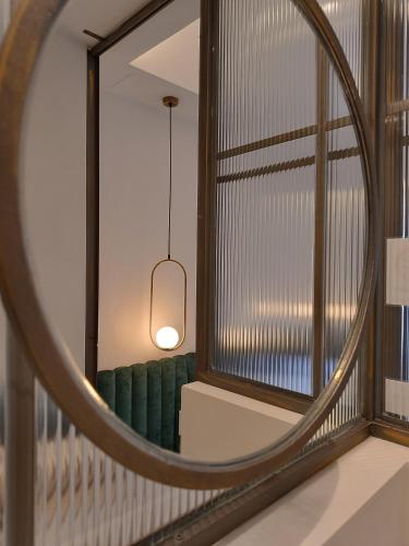 Ένα ή περισσότερα κρεβάτια σε δωμάτιο στο MUSES LUXURY SUITES