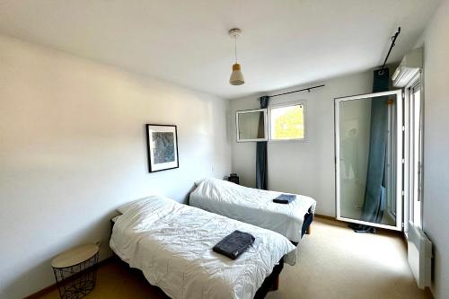 Ένα ή περισσότερα κρεβάτια σε δωμάτιο στο Les Naïades F26 - 1 bedroom for 4 people !