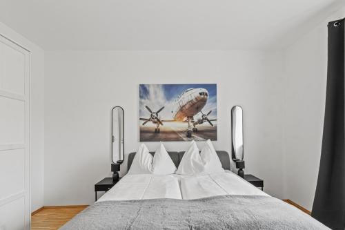 Tempat tidur dalam kamar di StayEasy Apartments Krieglach W2