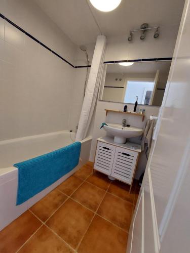 a bathroom with a sink and a bath tub at HACIENDA DEL MARQUES III To Chill in Cuevas del Almanzora