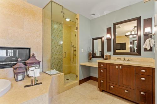 a large bathroom with a sink and a shower at Flagstaff #203 in Park City