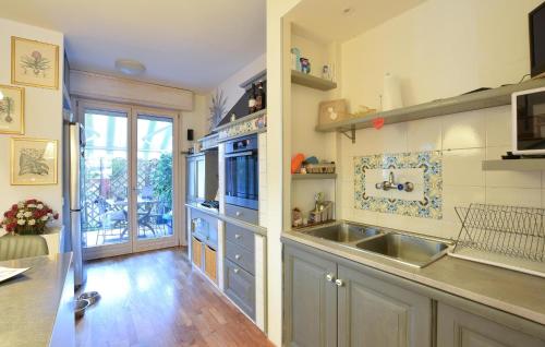 a kitchen with a sink and a counter at Awesome Home In Bergamo With Wifi in Bergamo