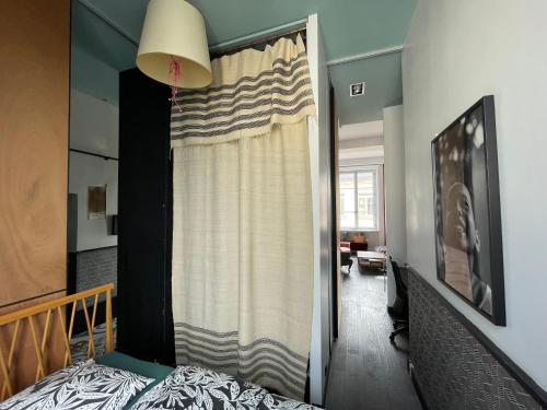 Katil atau katil-katil dalam bilik di LYON4 cocooning centre Croix Rousse 86m2-4P