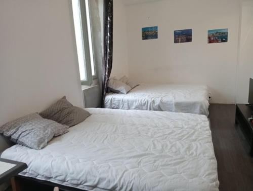 Katil atau katil-katil dalam bilik di Studio 300 Vieux Port Opéra Marseille