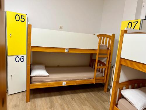 a bunk bed room with two bunk beds at Albergue O Burgo in O Pedrouzo