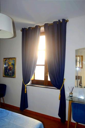 Postel nebo postele na pokoji v ubytování B&B Al Mare Sorrento