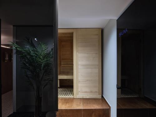 a room with a closet with a plant in it at The Newel Acropolis in Athens