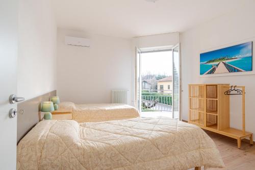 Postel nebo postele na pokoji v ubytování Roomy and bright apartments with terrace!
