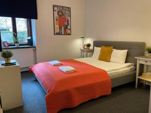 מיטה או מיטות בחדר ב-Millenium Apartments
