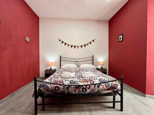 Un pat sau paturi într-o cameră la B&B I TRE SANTI