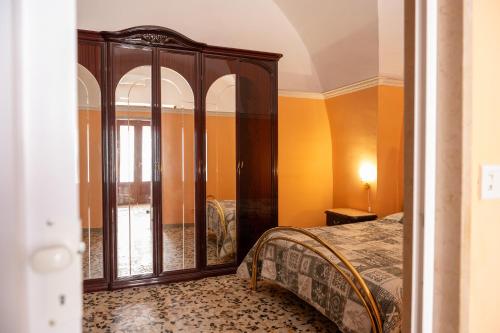 Postel nebo postele na pokoji v ubytování Casa Lucia - Siti storici e Saline Naturali - Pet Friendly