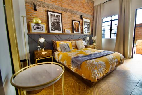 Ένα ή περισσότερα κρεβάτια σε δωμάτιο στο Hotel Boutique Santa Elena