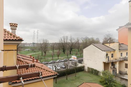 a view of a parking lot from a building at Santa Giulia Suite - 15 minutes from city centre in Milan