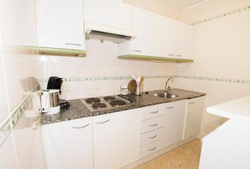 Kuchyň nebo kuchyňský kout v ubytování EDIFICIO PEÑASOL