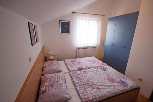 Posteľ alebo postele v izbe v ubytovaní Apartments Barisic
