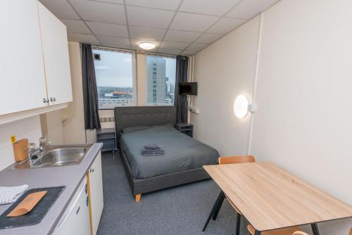 Køkken eller tekøkken på Standard En-suite Apartment 7