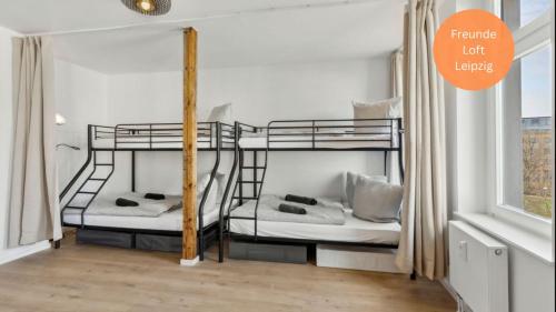 Postel nebo postele na pokoji v ubytování Loft für 10 Freunde