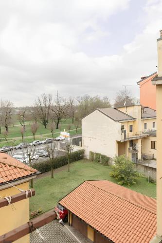 an aerial view of a building and a yard at Santa Giulia Suite - 15 minutes from city centre in Milan