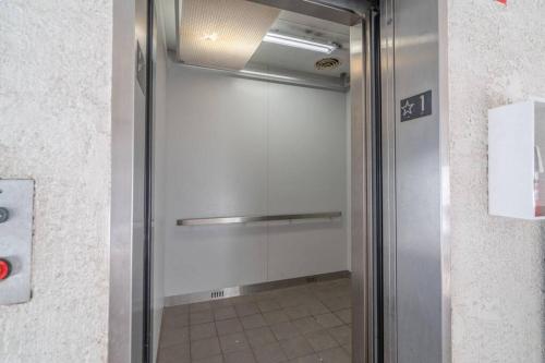 a shower stall with a door in a bathroom at Perfect Family Escape - 3 Bed Condo with Pools in St. George