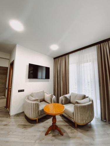 Телевизор и/или развлекательный центр в Royal Renaissance Hotel