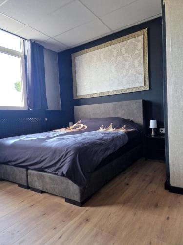 Postel nebo postele na pokoji v ubytování B&B 't Kloaster