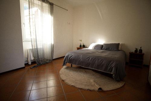 Postel nebo postele na pokoji v ubytování A D Rooms - Il Campanile